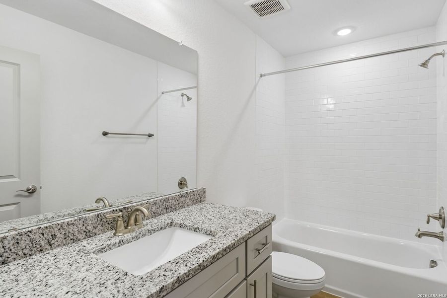 Furnished interior view inside a new home in Magnolia Village North, San Antonio (Image 12).