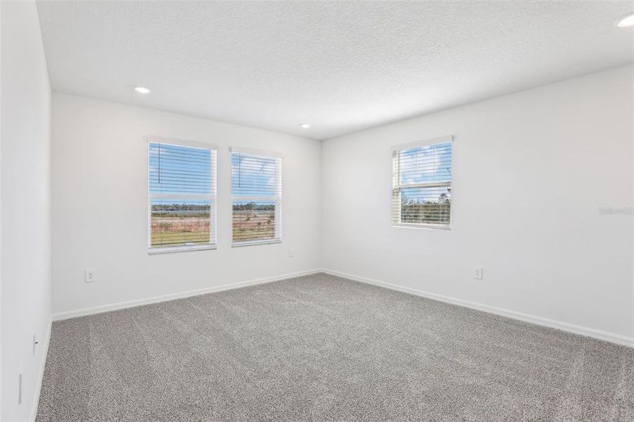 Spacious, unfurnished interior of a new home in Lake Deer Estates - Signature Series, Poinciana (Image 38). Spacious, unfurnished interior of a new home in Lake Deer Estates - Signature Series, Poinciana (Image 38).