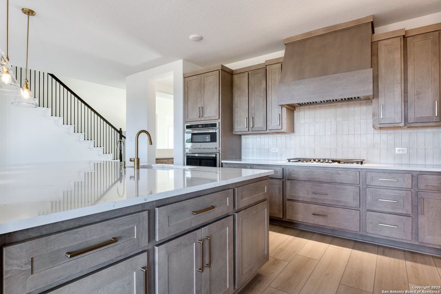 Furnished interior view inside a new home in Megan's Landing 70's, Castroville (Image 7).
