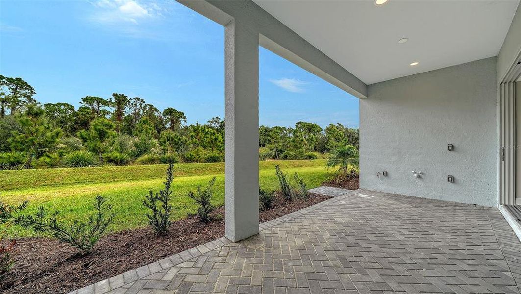 Exterior details and patio area of a home in , Sarasota (Image 24).