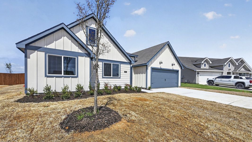 Representative exterior photo of a completed home built from the Egret by D.R. Horton in Windrose, Pilot Point, TX (Image 2). Representative exterior photo of a completed home built from the Egret by D.R. Horton in Windrose, Pilot Point, TX (Image 2).