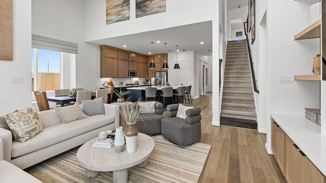 Representative furnished interior of a home built from the Magnolia by Brightland Homes in Sunterra, Katy (Image 7).