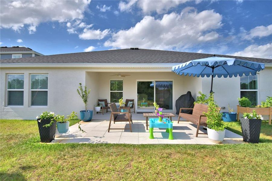 Exterior details and patio area of a home in Harmony at Lake Eloise, Winter Haven (Image 28).