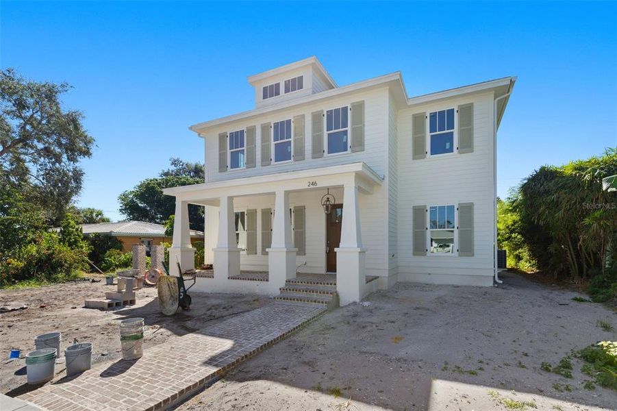 Front exterior of a new home in , St. Petersburg, FL, highlighting curb appeal (Image 7).