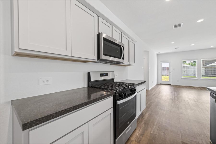 Furnished interior view inside a new home in Breckenridge Forest, Spring (Image 13).