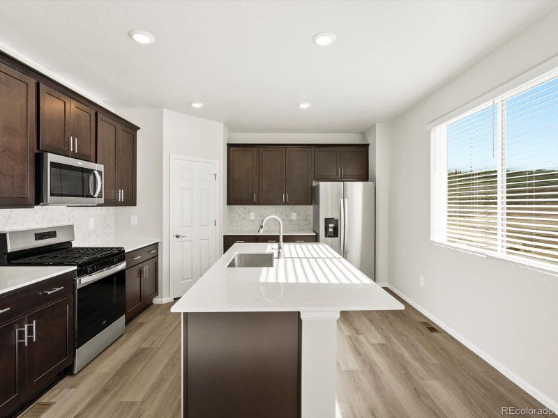 Furnished interior view inside a new home in Poudre Heights: The Lakes Collection, Windsor (Image 14).