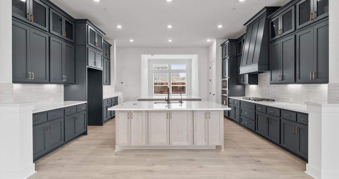 Representative furnished interior of a home built from the Everly by Chesmar Homes in Sweetwater, Austin (Image 3).