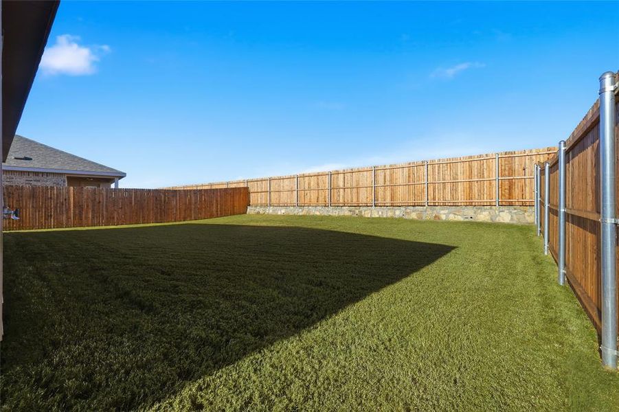 Exterior details and patio area of a home in Patriot Estates, Venus (Image 3).