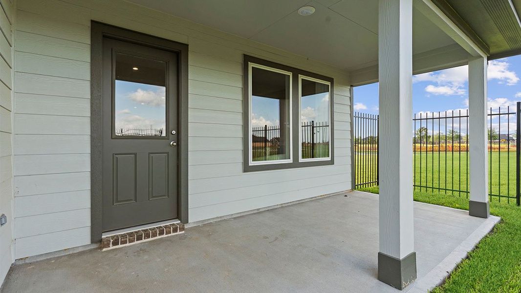 Exterior details and patio area of a home in Tamarron, Fulshear (Image 2).