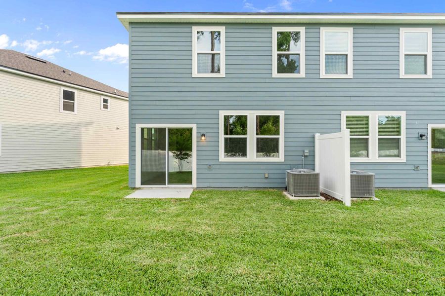 Davor Paired Home Backyard with Patio at The Landings at Pecan Park in Jacksonville