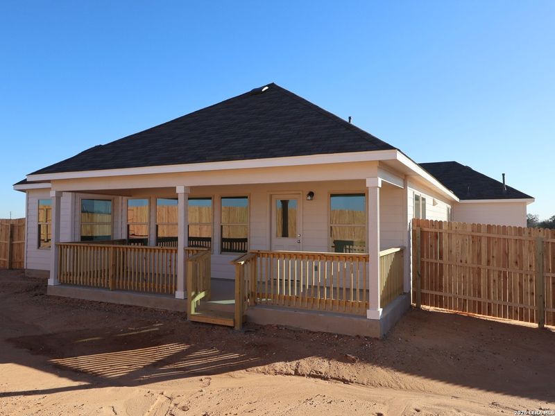 Exterior details and patio area of a home in Hickory Ridge, Elmendorf (Image 4).