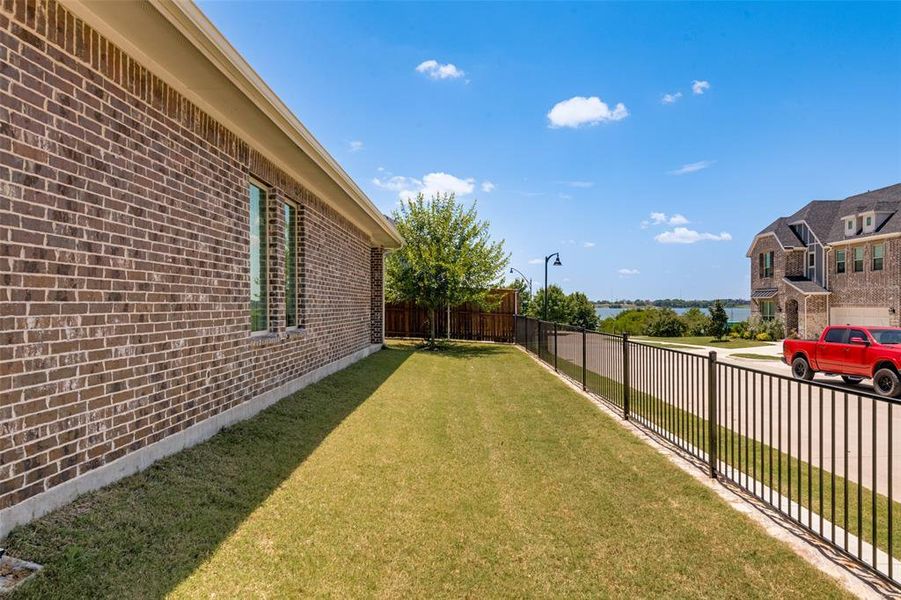 Exterior details and patio area of a home in Bayside, Rowlett (Image 23). Exterior details and patio area of a home in Bayside, Rowlett (Image 23).