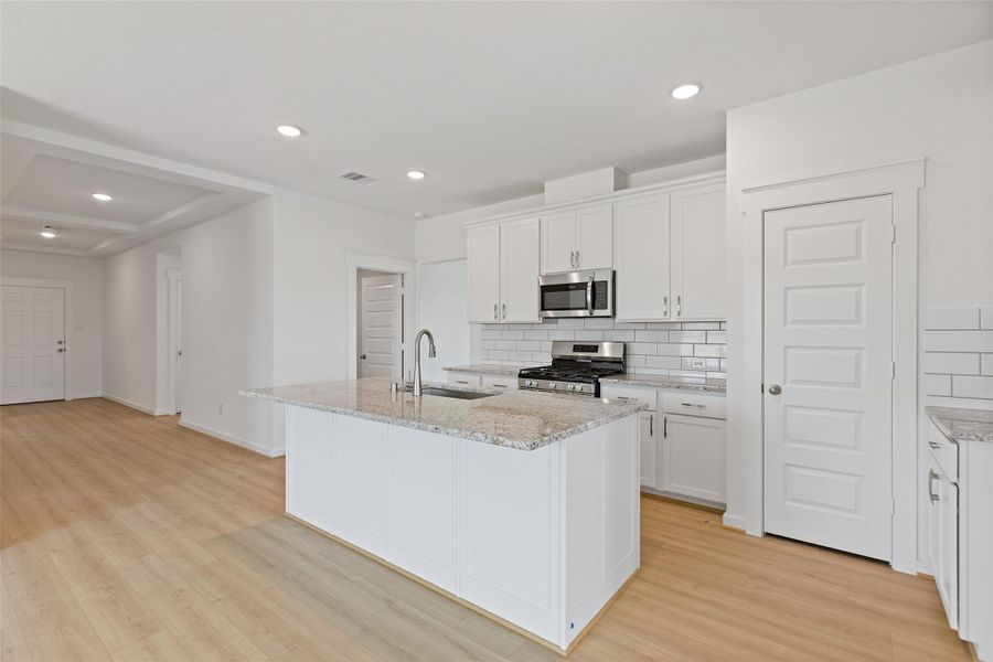 Furnished interior view inside a new home in Sunterra, Katy (Image 6). Furnished interior view inside a new home in Sunterra, Katy (Image 6).