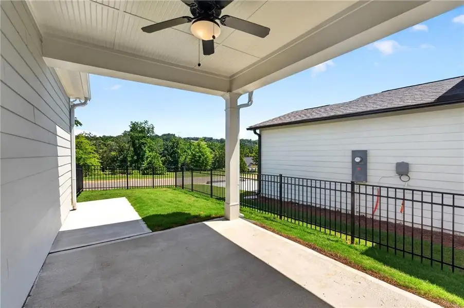 Exterior details and patio area of a home in Marble Tree, Ball Ground (Image 26).