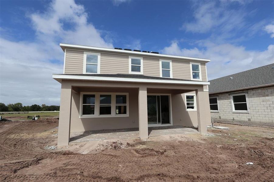 Exterior details and patio area of a home in Center Lake on the Park, St. Cloud (Image 3).