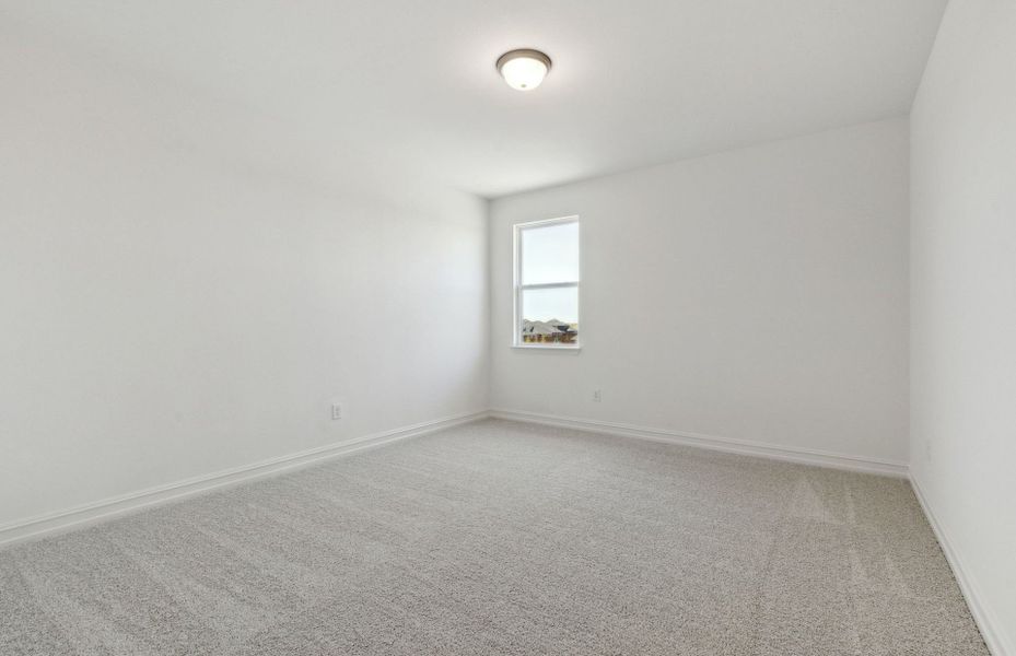 Spacious secondary bedroom features ample closet space Spacious secondary bedroom features ample closet space