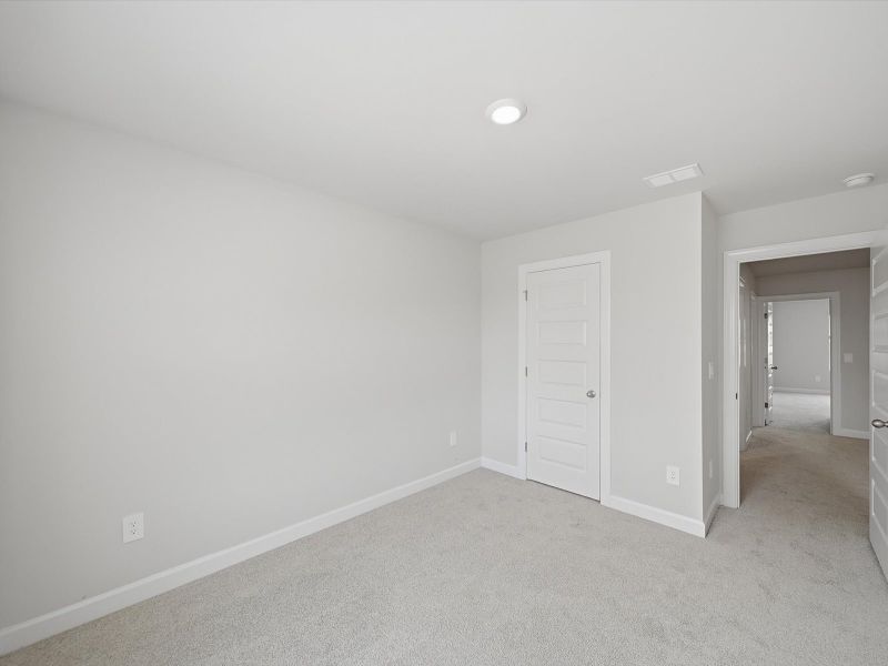 Spacious, unfurnished interior of a new home in Crossing at Abner Creek Townes, Greer (Image 19).