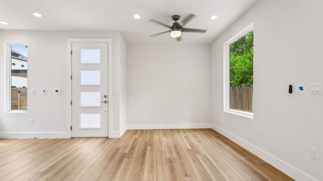 Entryway with light wood finished floors, recessed lighting, and ceiling fan Entryway with light wood finished floors, recessed lighting, and ceiling fan