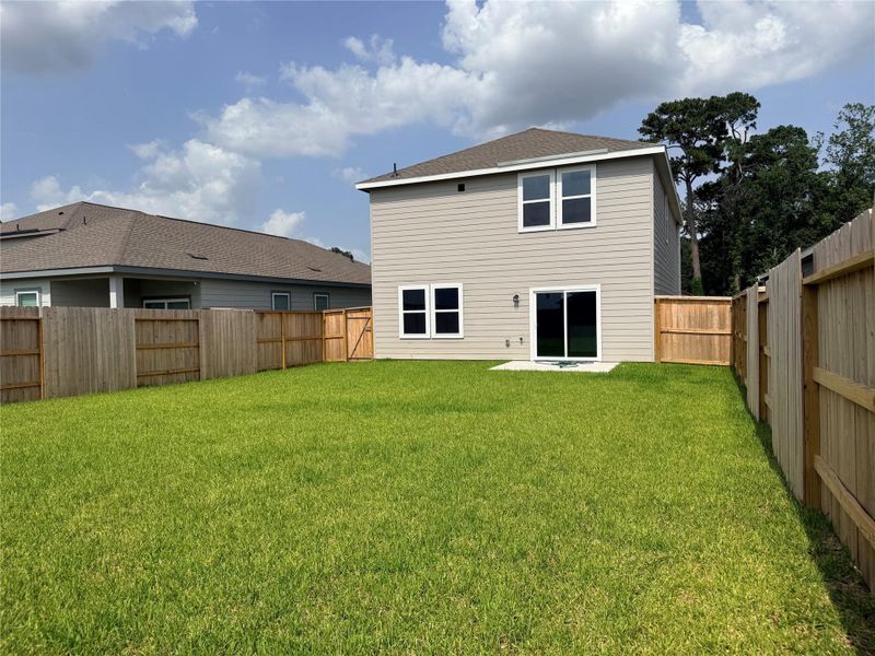 Exterior details and patio area of a home in The Landing, New Caney (Image 3). Exterior details and patio area of a home in The Landing, New Caney (Image 3).