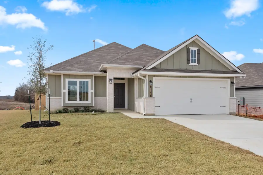 Front exterior of a new home in Arrowhead Farms, Caldwell, TX, highlighting curb appeal (Image 1). Front exterior of a new home in Arrowhead Farms, Caldwell, TX, highlighting curb appeal (Image 1).