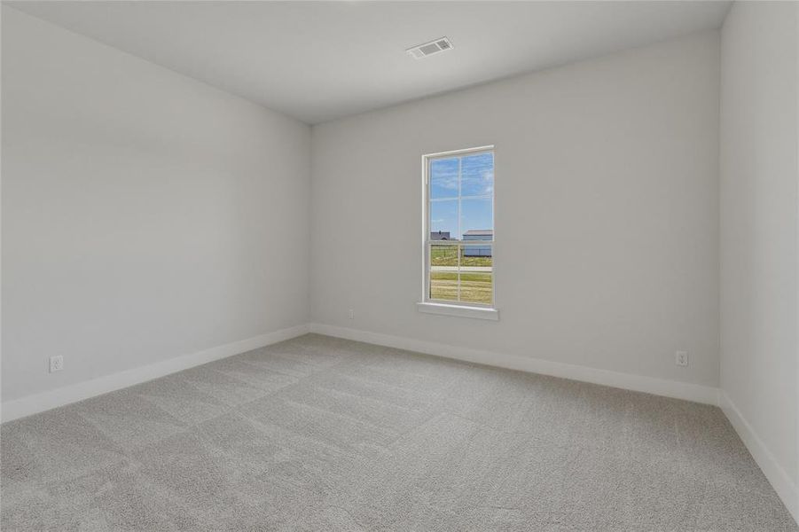 Neutral wall tones complemented by patterned carpeting Neutral wall tones complemented by patterned carpeting