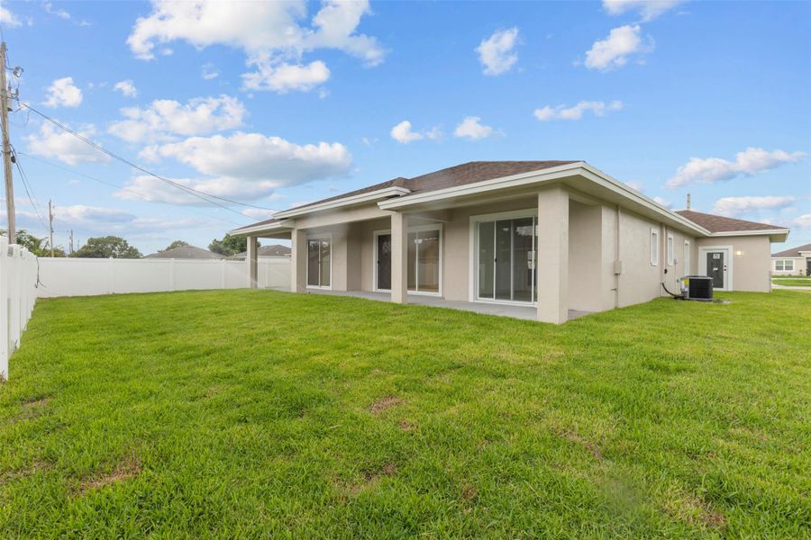 Exterior details and patio area of a home in , Port St. Lucie (Image 24).