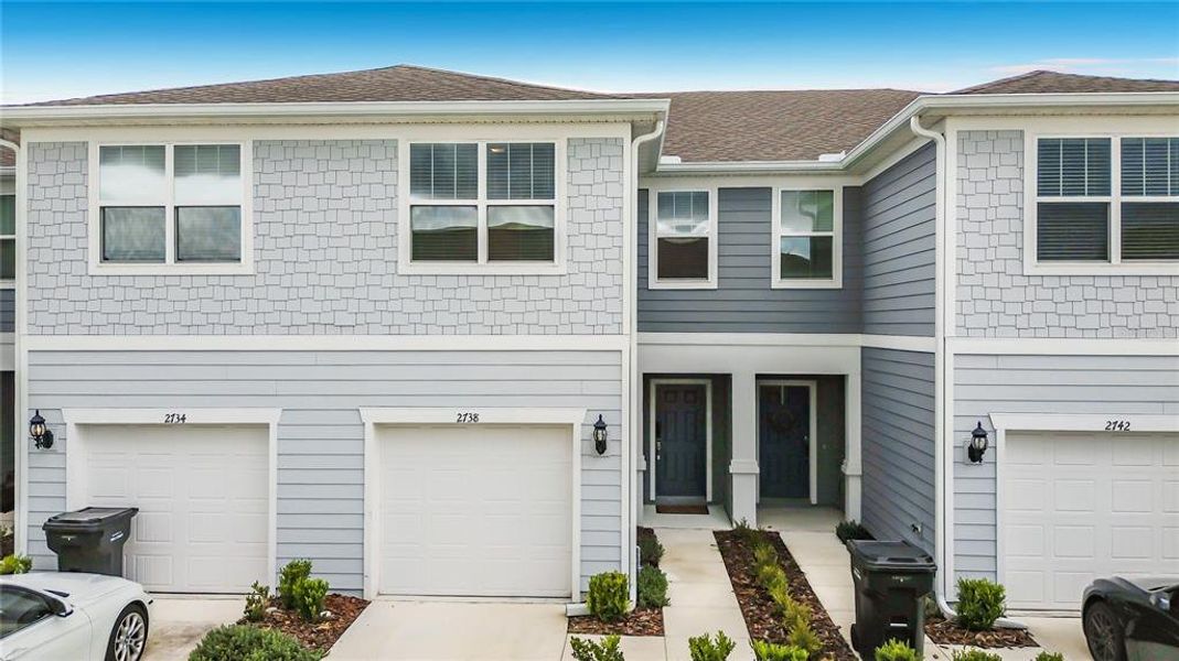 Front exterior of a new home in , Davenport, FL, highlighting curb appeal (Image 2). Front exterior of a new home in , Davenport, FL, highlighting curb appeal (Image 2).