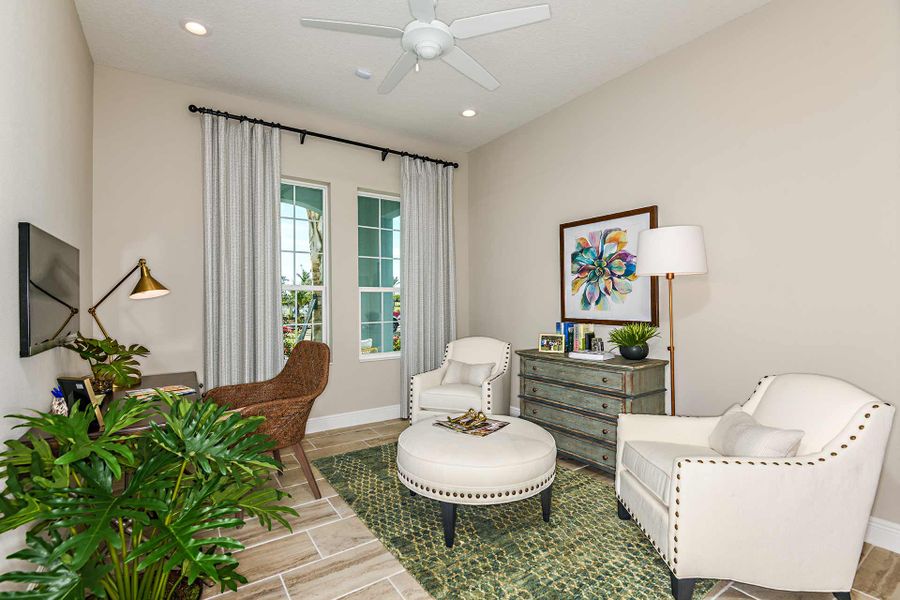 Representative furnished interior of a home built from the Kiawah 2 by Neal Communities in SkySail, Naples (Image 10).