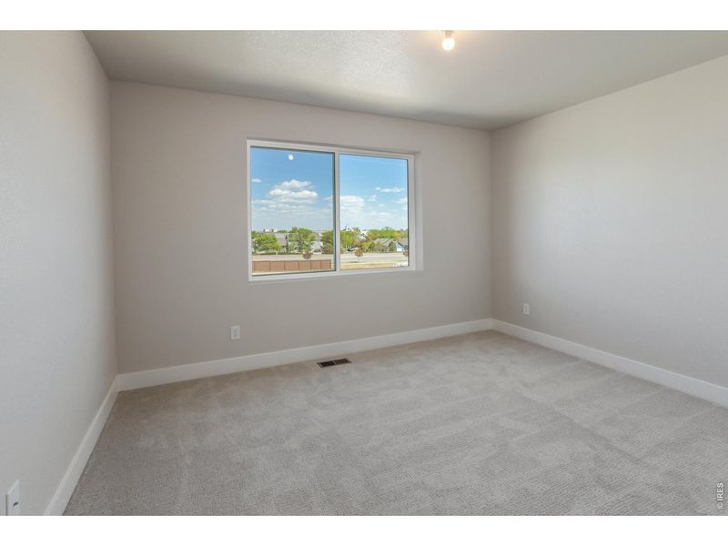 Spacious, unfurnished interior of a new home in Wilson Commons, Loveland (Image 24).