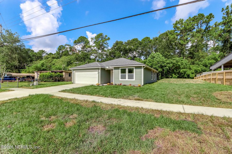 Exterior details and patio area of a home in , Jacksonville (Image 23). Exterior details and patio area of a home in , Jacksonville (Image 23).