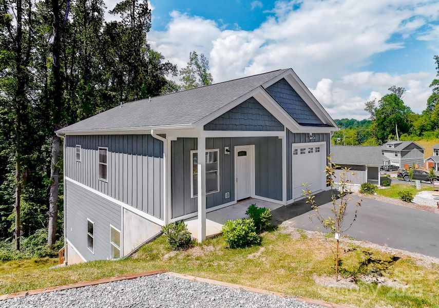 Front exterior of a new home in , Asheville, NC, highlighting curb appeal (Image 15). Front exterior of a new home in , Asheville, NC, highlighting curb appeal (Image 15).