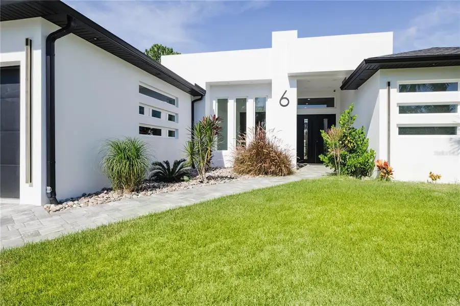 Exterior details and patio area of a home in , Palm Coast (Image 3).