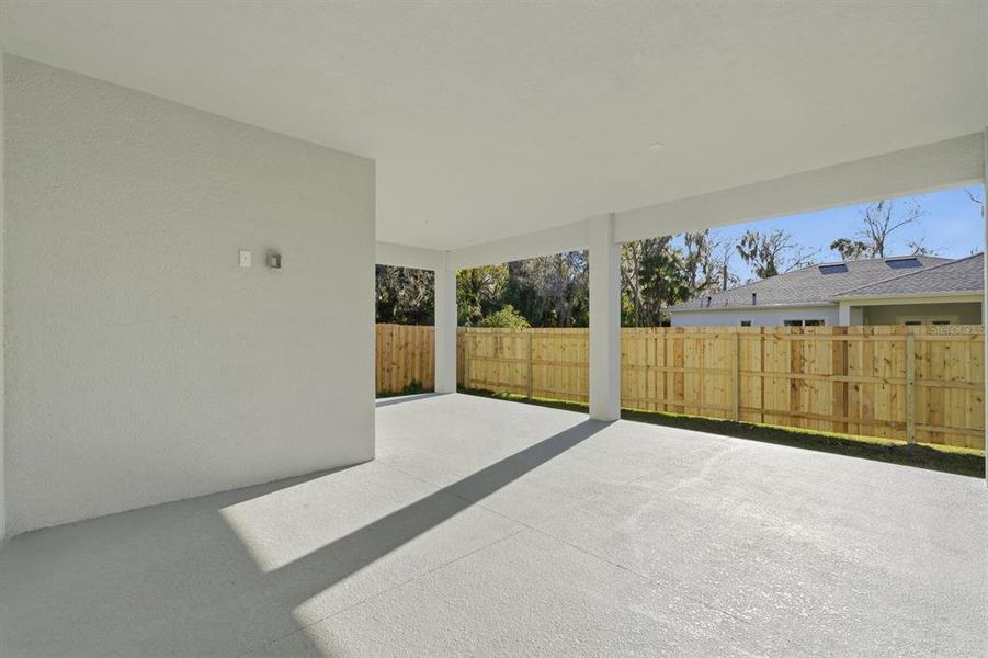 Exterior details and patio area of a home in , New Smyrna Beach (Image 27).
