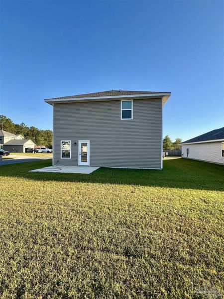 Exterior details and patio area of a home in Allison Acres, Cantonment (Image 2).