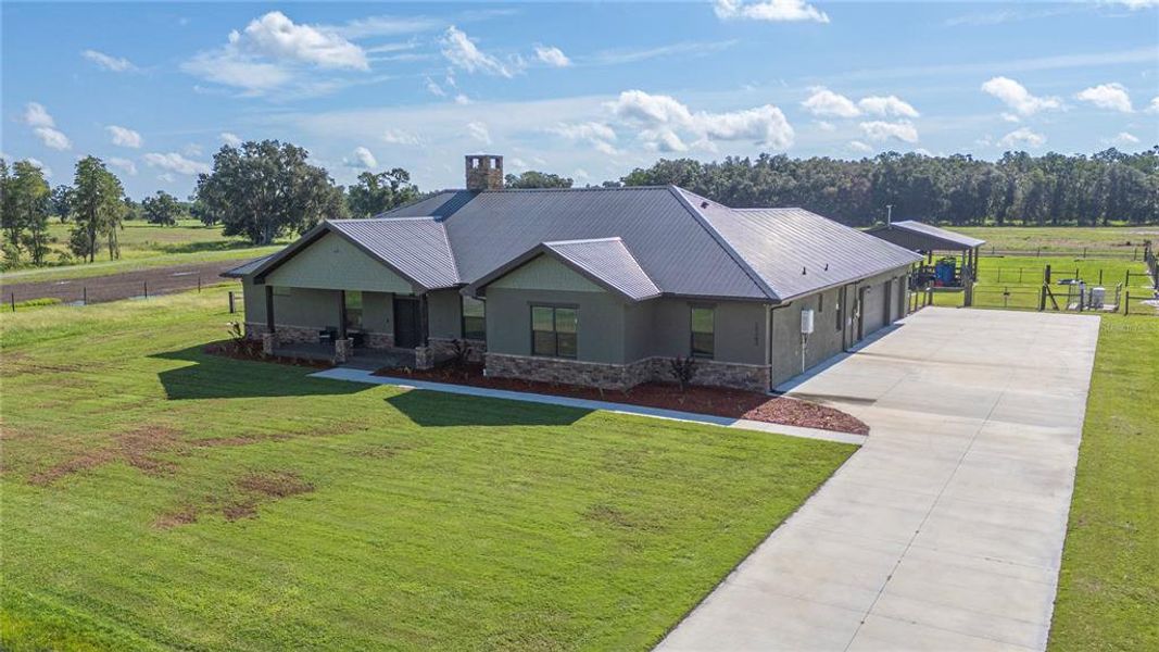 Front exterior of a new home in , Lakeland, FL, highlighting curb appeal (Image 22).