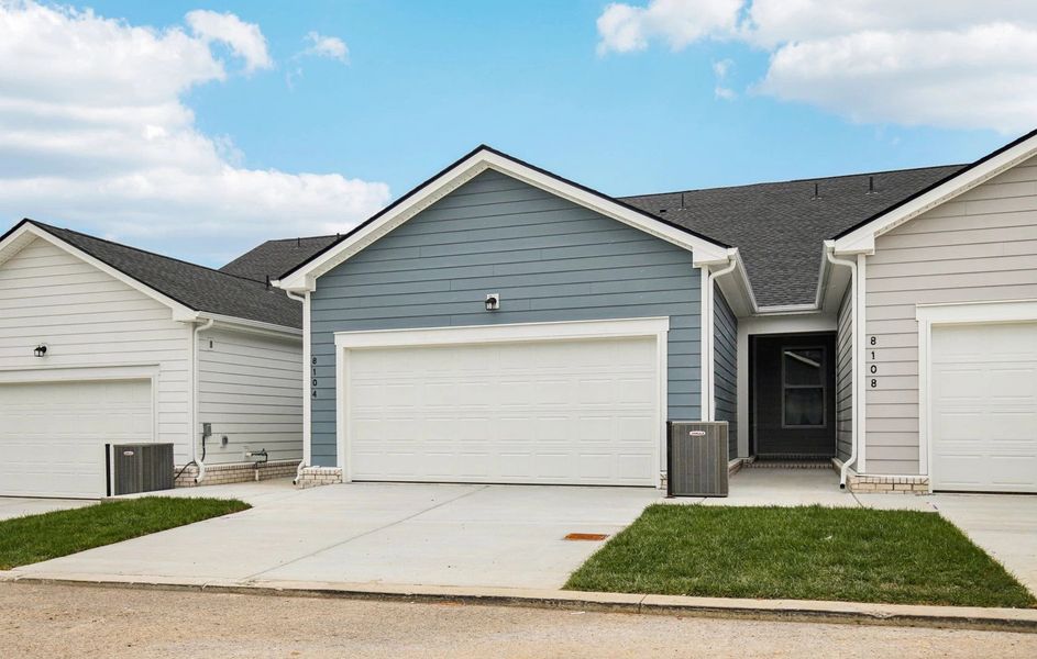 Front exterior of a new home in Stewart's Glen | 55+ Community, Smyrna, TN, highlighting curb appeal (Image 28). Front exterior of a new home in Stewart's Glen | 55+ Community, Smyrna, TN, highlighting curb appeal (Image 28).