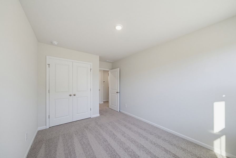 Spacious, unfurnished interior of a new home in Sweetbrier, Durham (Image 26).