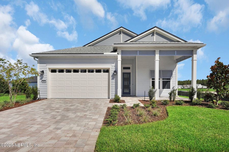Front exterior of a new home in Del Webb Saint Johns, St. Johns, FL, highlighting curb appeal (Image 17).