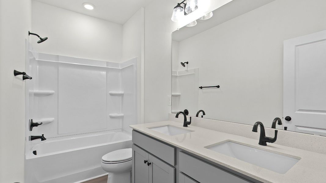 Furnished interior view inside a new home in Bluffs at Sun Colony, Little River (Image 19).