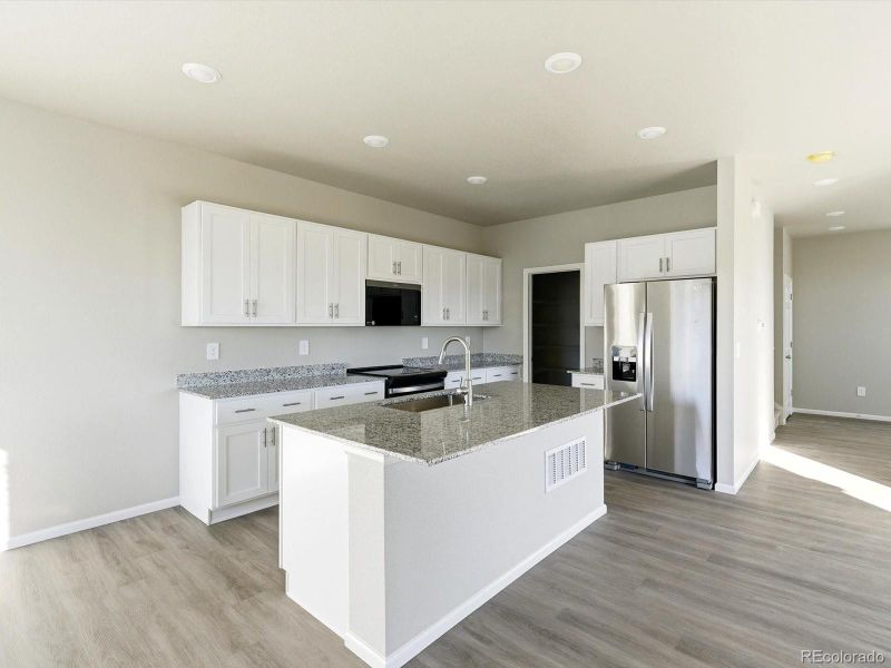 Furnished interior view inside a new home in , Thornton (Image 11).