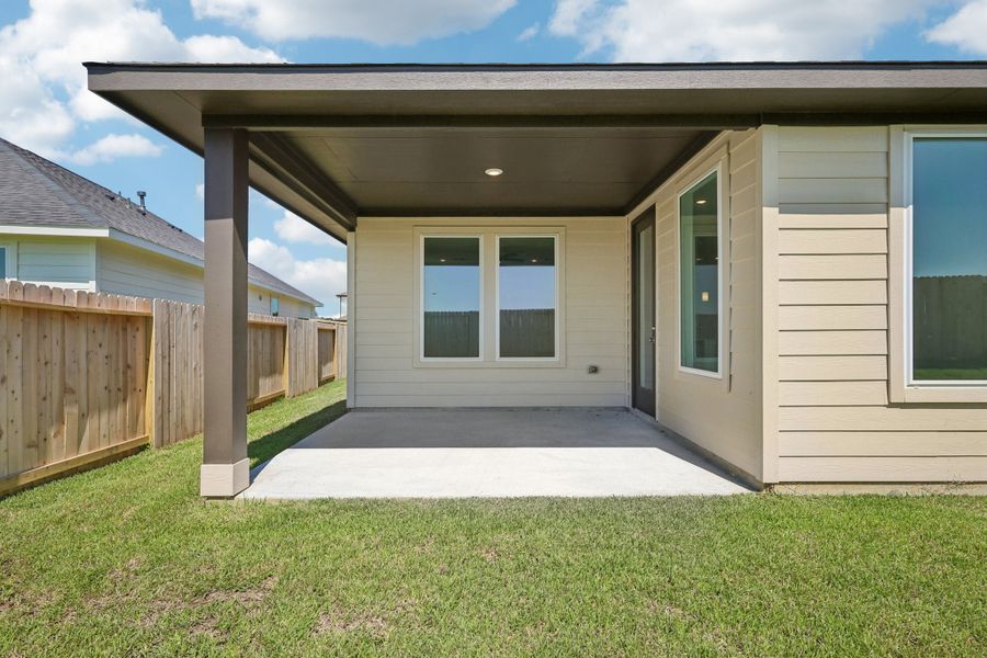 Exterior details and patio area of a home in The Canopies, Splendora (Image 2). Exterior details and patio area of a home in The Canopies, Splendora (Image 2).