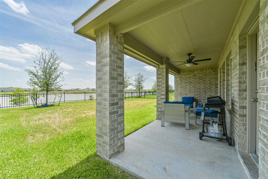 Exterior details and patio area of a home in Sunterra, Katy (Image 4).