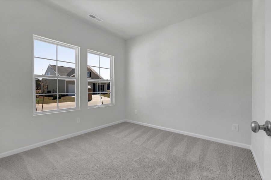 Spacious, unfurnished interior of a new home in River Tide Farms, Bolivia (Image 22).