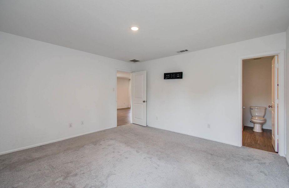 Spacious, unfurnished interior of a new home in Tavola: Cottage Collection, New Caney (Image 28).