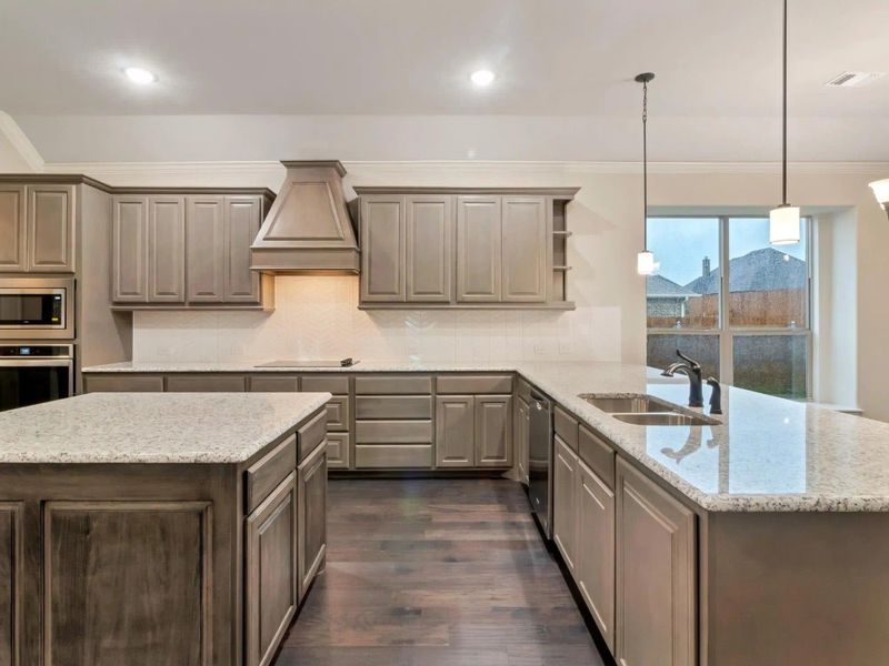 Kitchen | Concept 2533 at Mockingbird Hills in Joshua, TX by Landsea Homes