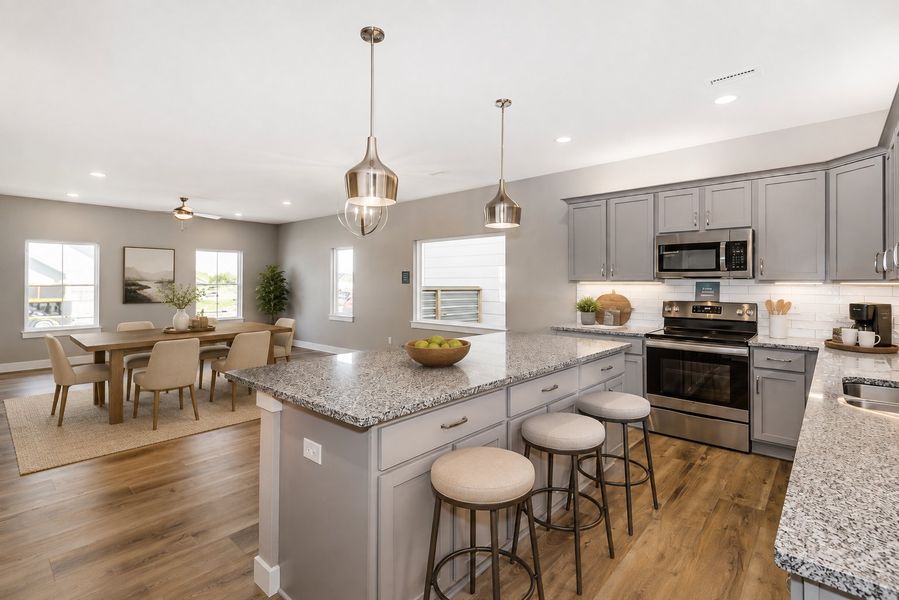 Representative furnished interior of a home built from the Larkspur by Perfection Builders in Heritage Commons, Andover (Image 3).