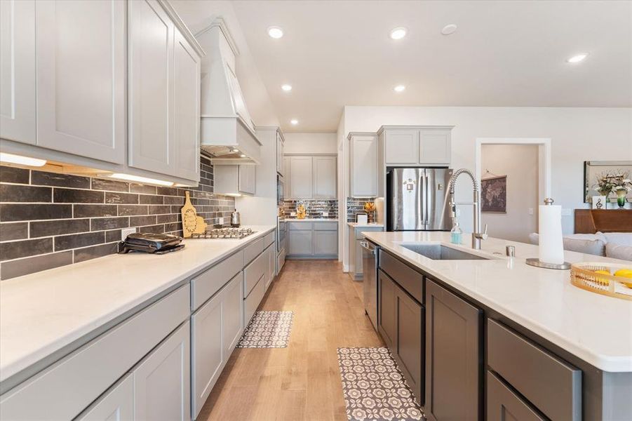 Extended cabinets with under-cabinet lighting and beautiful finishes