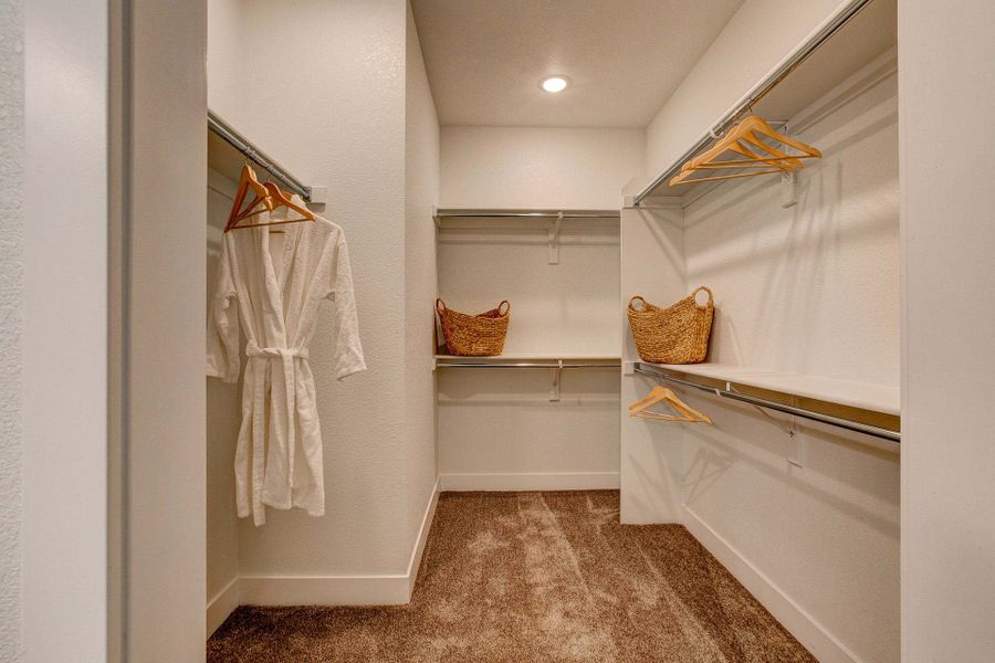 Primary Closet - Not Actual Home - Finishes May Vary