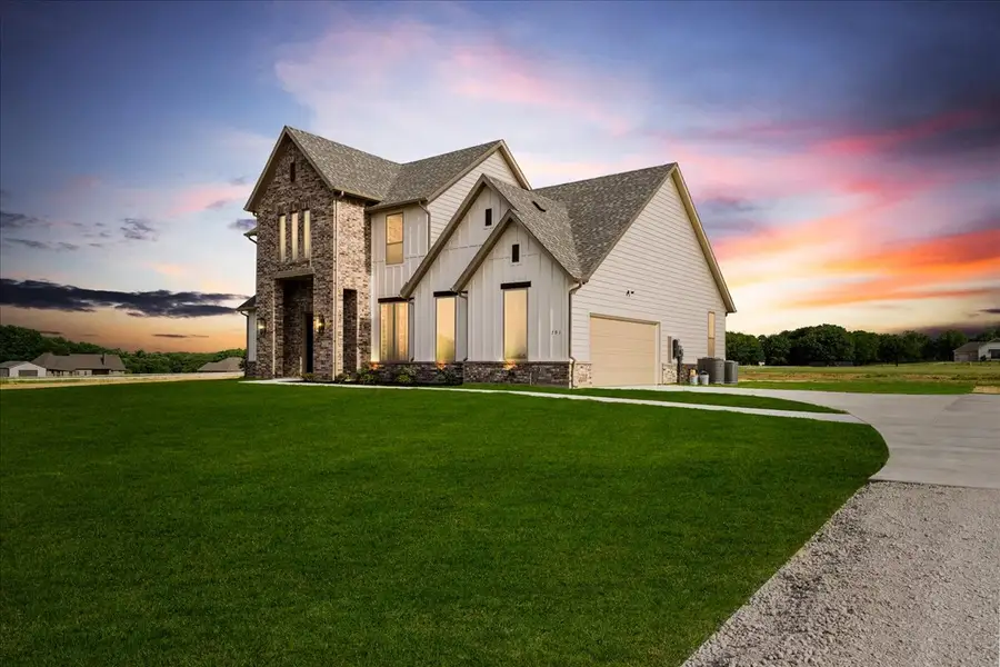 Front exterior of a new home in Spring Valley Ranch, Paradise, TX, highlighting curb appeal (Image 24).