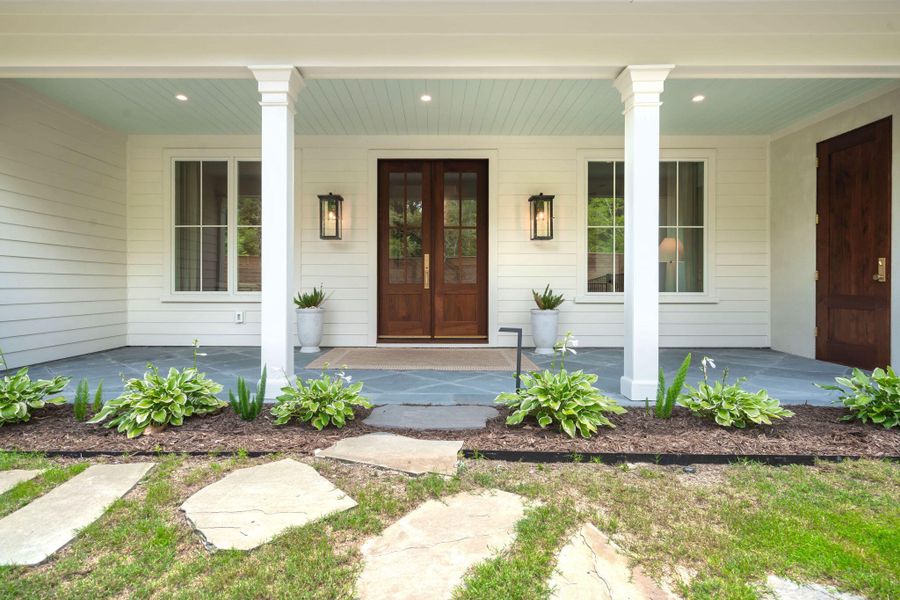 Exterior details and patio area of a home in , Johns Island (Image 32).